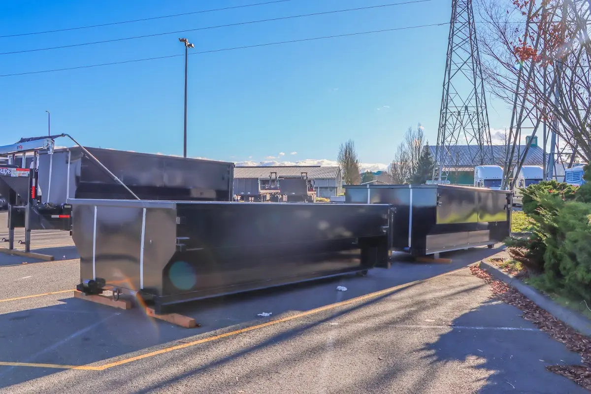 Roll-off dumpster ready for waste disposal at job site for 4 Yard Dumpster Rental in Greenfield
